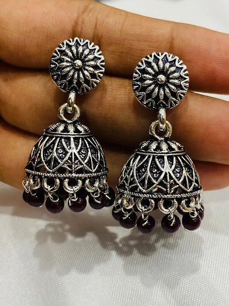 Appealing Oxidized Silver Jhumkhas With Maroon Bead Hangings For Women