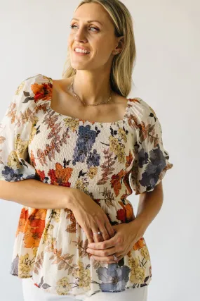 The Ashbelle Smocked Peplum in Rust Multi